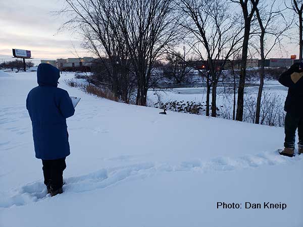 People watching for birds for the Christmas bird count on a winter day